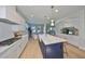 Spacious kitchen with modern appliances, large island, and bright lighting at 3915 W Euclid Ave, Tampa, FL 33629
