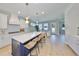 Spacious kitchen with modern appliances, large island, and bright lighting at 3915 W Euclid Ave, Tampa, FL 33629