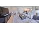 Living room with modern decor, neutral colors, and wood floors at 3915 W Euclid Ave, Tampa, FL 33629
