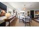 Elegant dining room with hardwood floors and ample natural light at 409 Erie Ave, Tampa, FL 33606
