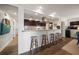 Modern kitchen featuring a breakfast bar with stool seating at 409 Erie Ave, Tampa, FL 33606