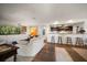 Comfortable living room with hardwood floors and a built-in entertainment center at 409 Erie Ave, Tampa, FL 33606