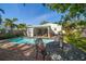 Refreshing pool with patio area, ideal for outdoor relaxation and entertaining at 409 Erie Ave, Tampa, FL 33606