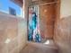 Bathroom shower featuring a unique shower curtain and stylish tile at 409 Erie Ave, Tampa, FL 33606