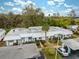Charming exterior of a well-maintained condo community with mature landscaping at 4235 Richmere Dr # 4235, New Port Richey, FL 34652