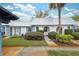 Charming home showcasing a well-manicured lawn and freshly painted exterior in a desirable community at 4235 Richmere Dr # 4235, New Port Richey, FL 34652
