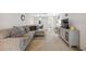 Inviting living room showcasing a comfortable sectional sofa and stylish console table at 4235 Richmere Dr # 4235, New Port Richey, FL 34652