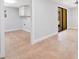 Bright laundry room with tile flooring and storage cabinets at 4509 26Th S Ave, Tampa, FL 33619
