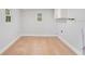 Laundry room with tile flooring, cabinets and window at 4509 26Th S Ave, Tampa, FL 33619