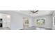 Open living room with view to the kitchen and backyard at 4509 26Th S Ave, Tampa, FL 33619