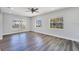 Bright and open living room featuring new floors, neutral paint, and large windows at 4509 26Th S Ave, Tampa, FL 33619
