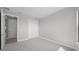 Bedroom with carpet, closet, and ensuite bathroom at 4597 Blue Star Ct, North Port, FL 34289
