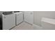 Laundry room featuring new washer and dryer at 4597 Blue Star Ct, North Port, FL 34289