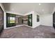 Screened patio with stone flooring and sliding doors to interior of house at 4597 Blue Star Ct, North Port, FL 34289