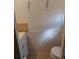 Compact bathroom featuring a toilet, vanity, and decorative accents at 46 Washington Ct # 28, Palm Harbor, FL 34684