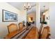 Dining room boasts a chandelier and connects to the living room at 4802 Raintree Street E Cir, Bradenton, FL 34203