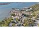 Aerial view of waterfront property with multiple buildings, a marina, and water views at 700 N Osceola Ave # 504, Clearwater, FL 33755