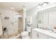 Modern bathroom featuring a glass walk-in shower and a sleek white vanity at 700 N Osceola Ave # 504, Clearwater, FL 33755