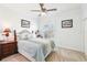 Comfortable bedroom featuring serene decor and a view-framing window at 700 N Osceola Ave # 504, Clearwater, FL 33755