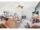 Bright living room showcasing stylish furnishings and sliding door access to the balcony at 700 N Osceola Ave # 504, Clearwater, FL 33755