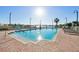 Enjoy the scenic pool and tanning deck with lounge chairs and waterfront view on a sunny day at 700 N Osceola Ave # 504, Clearwater, FL 33755