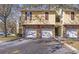 Charming townhome featuring stone accents, attached garages, and a welcoming entryway, perfect for comfortable living at 10115 Courtney Palms Blvd # 202, Tampa, FL 33619
