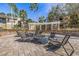 Inviting fire pit area with comfortable seating, perfect for socializing and enjoying the outdoors at 10115 Courtney Palms Blvd # 202, Tampa, FL 33619