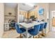 Bright eat-in kitchen featuring a breakfast bar with seating and stainless steel appliances at 10115 Courtney Palms Blvd # 202, Tampa, FL 33619