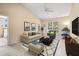 Cozy living room featuring bright natural light, comfortable seating and neutral decor at 10115 Courtney Palms Blvd # 202, Tampa, FL 33619