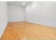 Bright racquetball court featuring hardwood floors and well-lit space for intense gameplay at 10115 Courtney Palms Blvd # 202, Tampa, FL 33619