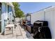 Backyard features a work area with storage and equipment, enclosed by a white fence at 11492 60Th Lane, Pinellas Park, FL 33782