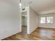 Spacious bedroom with wood flooring and a bright, airy atmosphere at 11492 60Th Lane, Pinellas Park, FL 33782
