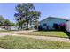 Charming single-story home with well-manicured lawn, colorful flowers, and a spacious driveway at 11492 60Th Lane, Pinellas Park, FL 33782
