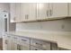 Kitchen boasting new white cabinets, quartz countertops, and stainless steel hardware at 11492 60Th Lane, Pinellas Park, FL 33782