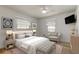 Cozy bedroom with comfortable seating, stylish decor, and lots of natural light at 11492 60Th Lane, Pinellas Park, FL 33782