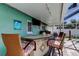 Charming outdoor bar with stylish seating, perfect for entertaining guests in the backyard at 11492 60Th Lane, Pinellas Park, FL 33782