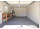 Spacious garage featuring painted floors, a work bench, and natural light at 1163 60Th S Ave, St Petersburg, FL 33705