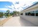 Spacious patio with a serene lake view, perfect for outdoor relaxation and entertaining at 1163 60Th S Ave, St Petersburg, FL 33705