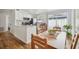 Well-designed kitchen, dining area, and patio creating the perfect flow for modern living at 1260 S Hillcrest Ave, Clearwater, FL 33756