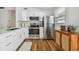 Modern kitchen featuring stainless steel appliances and white cabinetry at 1260 S Hillcrest Ave, Clearwater, FL 33756