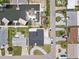 Overhead shot showcasing a home's new roof, boat dock, private boat lift, and circular driveway at 13701 Garris Dr, Hudson, FL 34667