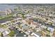 Expansive aerial view of waterfront homes with private docks and canal access in a coastal community at 13701 Garris Dr, Hudson, FL 34667