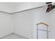 Spacious walk-in closet with ample hanging space and shelving at 13701 Garris Dr, Hudson, FL 34667