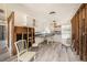 Kitchen displays white cabinets, new flooring, and bright natural light at 14040 Miramar Ave, Madeira Beach, FL 33708