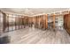 Bright, spacious living area with modern flooring and exposed framing, awaiting your personal touch at 14040 Miramar Ave, Madeira Beach, FL 33708