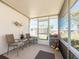 Relaxing lanai space is furnished with comfortable seating and offers views of the surrounding community at 14173 90Th Ave, Seminole, FL 33776