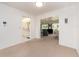 Spacious living room offering an open layout with views to the kitchen and ample natural light at 14173 90Th Ave, Seminole, FL 33776