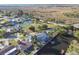 Wide aerial view of a waterfront neighborhood with a clear blue sky at 14924 Old Dixie Hwy, Hudson, FL 34667