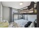 Cozy bedroom featuring a bunk bed with sea themed sheets and soft gray walls at 14924 Old Dixie Hwy, Hudson, FL 34667
