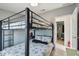 Comfortable bedroom featuring bunkbeds with sea-themed decor for a restful stay at 14924 Old Dixie Hwy, Hudson, FL 34667